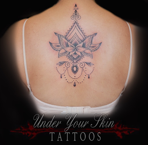 Explore m&m tattoo ideas, creative tattoo ideas in Green Cove Springs, available at Under Your Skin Tattoos