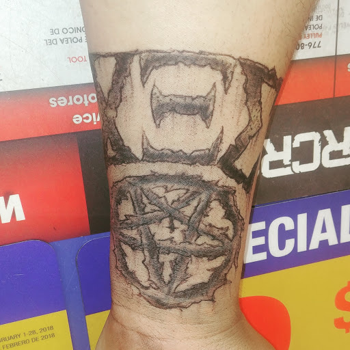 Explore simple men tattoo ideas, creative tattoo ideas in Saint Paul, available at Black Coffin Tattoo