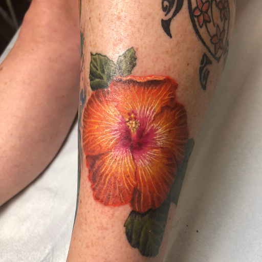 Explore tattoo of lips ideas, creative tattoo ideas in Englewood, available at Point of Entry Tattoo