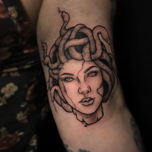 Explore small christian tattoo ideas, creative tattoo ideas in Atlanta, available at Golden Anchor Tattoo