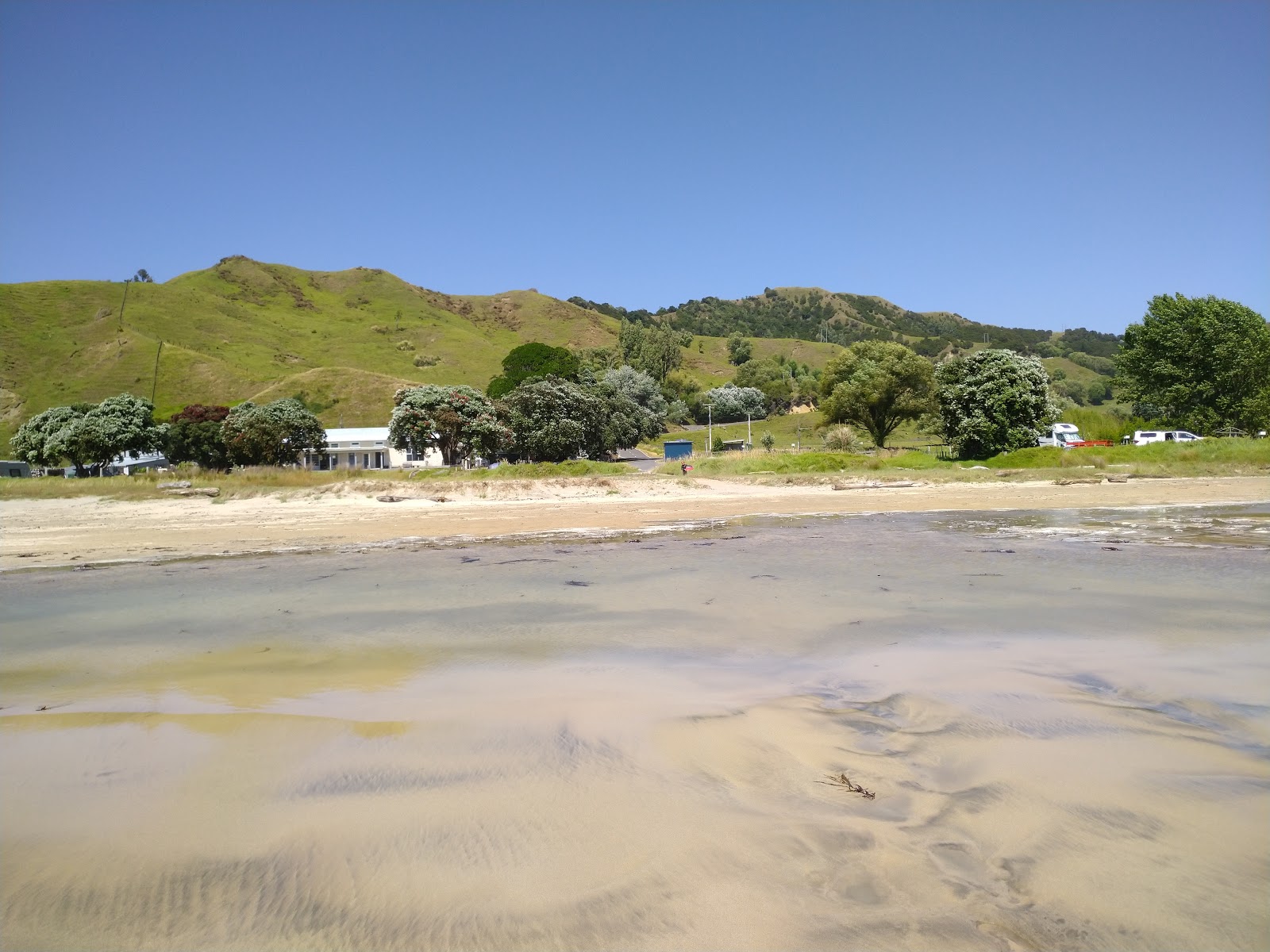 Photo of Anaura Beach surrounded by mountains