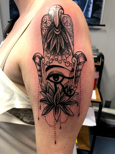 Explore japanese cherry blossom tattoo ideas, creative tattoo ideas in Muncie, available at The Tattoo Studio