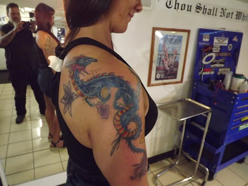 Explore tattoo ideas space liquid tattoo, creative tattoo ideas in Princeton, available at Custom Dreams Tattooing and Body Piercing