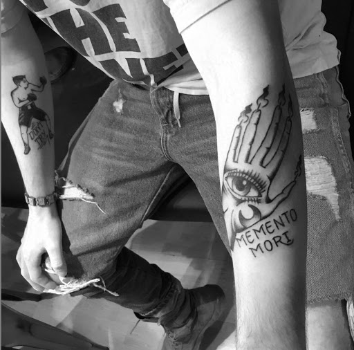 Explore engagement ring tattoo ideas, creative tattoo ideas in Lawrence, available at Standard Electric Tattooing