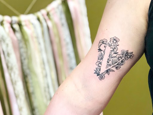 Explore evil angel tattoo ideas, creative tattoo ideas in Batavia, available at The Pretty Pin-Up Tattoo Parlor