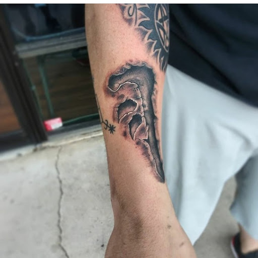 Explore paw print tattoo ideas, creative tattoo ideas in Atlantic Beach, available at The Ink Chamber Tattoo Parlor