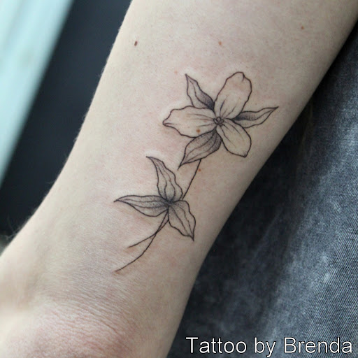 Explore skull neck tattoo ideas, creative tattoo ideas in Fort Myers, available at Tiger Lotus Tattoo and Piercing