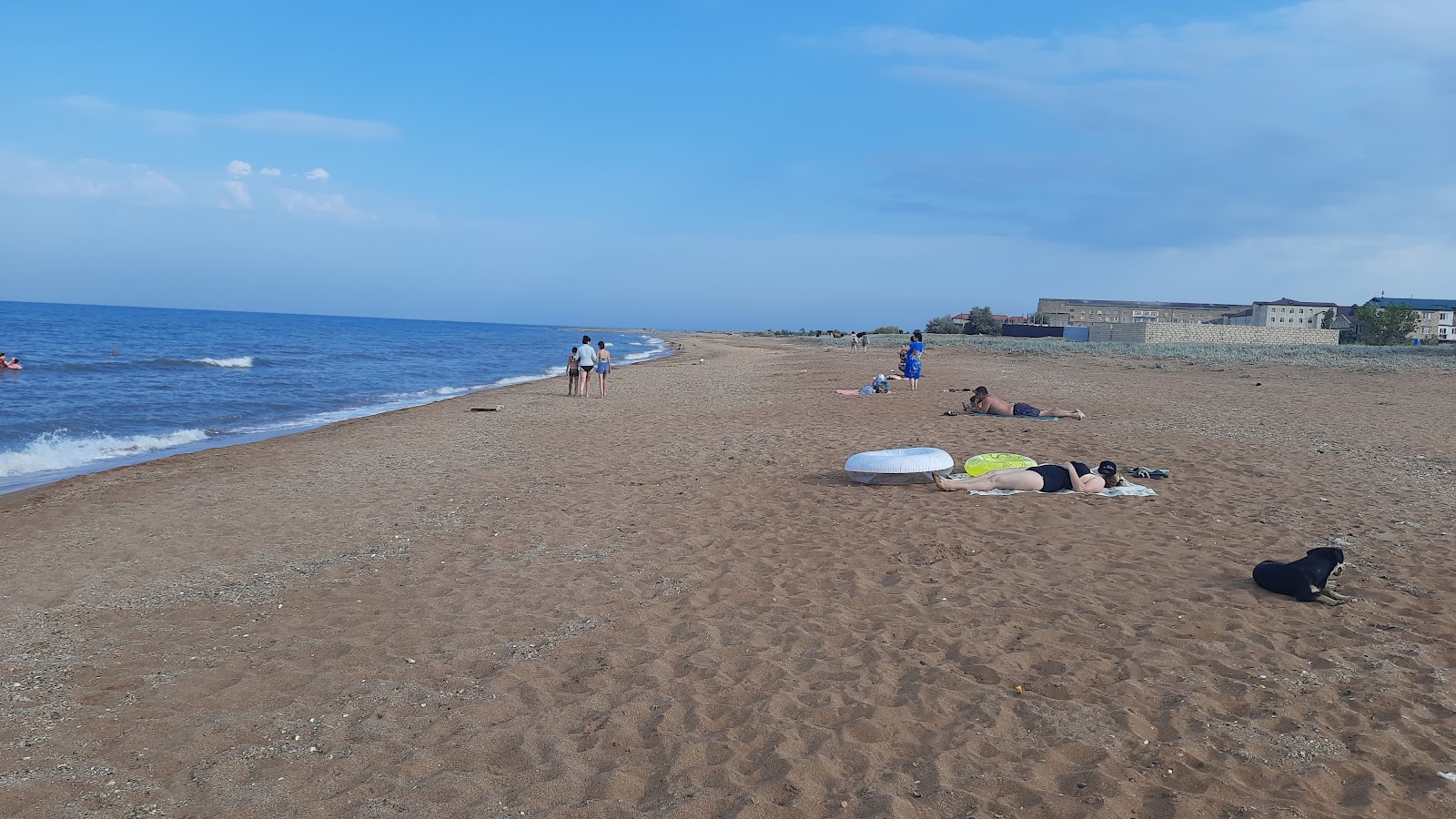 Foto di Palmira Beach con una superficie del sabbia beige