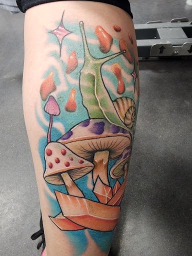 Explore magnolia tattoo ideas, creative tattoo ideas in College Station, available at Legacy Tattoo Lounge