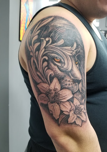 Explore tattoo ideas for triceps, creative tattoo ideas in Buffalo, available at Tattoo Dons Nickel City Tattoos