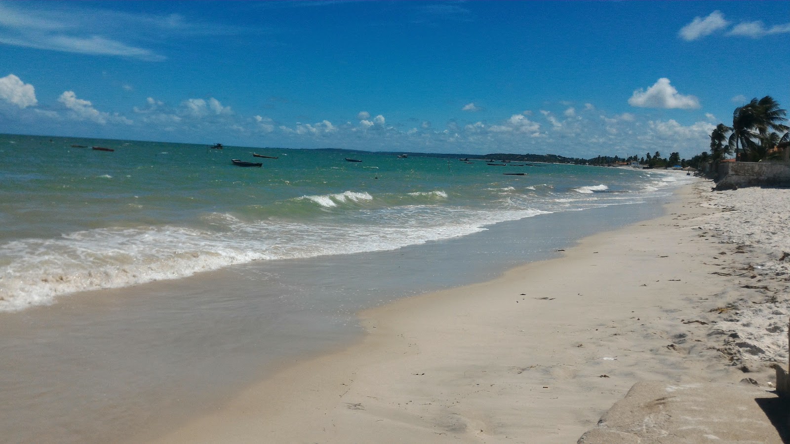 Foto di Punta dell'isola con una superficie del sabbia luminosa