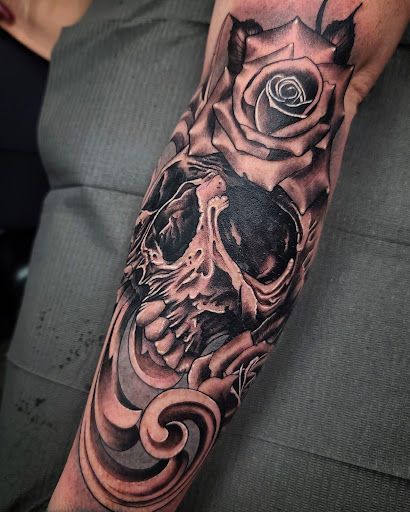 Find low back tattoo ideas for your next unique tattoo in Anchorage at SDITATTOO, LLC