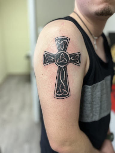 Explore the cure tattoo ideas, creative tattoo ideas in Tuttle, available at Rebel Alliance Ink