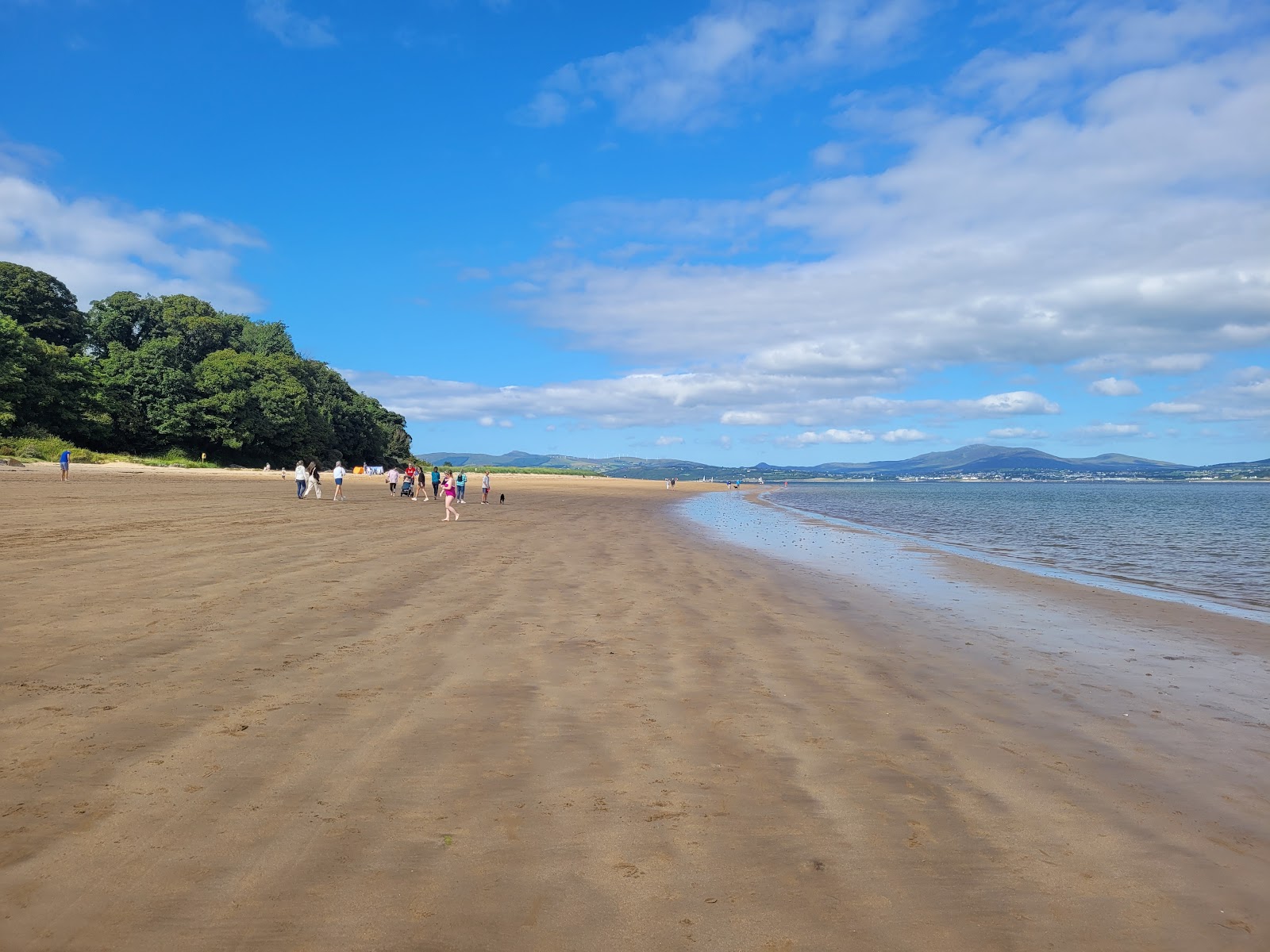 Photo of Rathmullan Beach with long straight shore