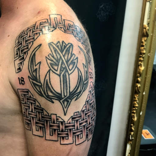 Explore tattoo cover up ideas male, creative tattoo ideas in Logan, available at Surreal Ink Tattoo & Body Piercing