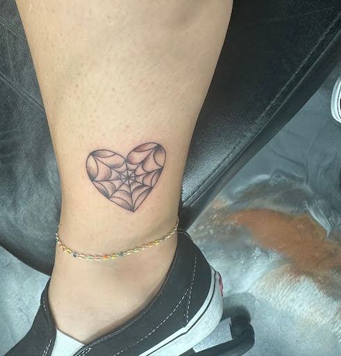 Explore big brother tattoo ideas, creative tattoo ideas in Cincinnati, available at UniquInk Tattoos & Piercings