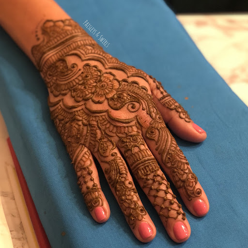 Explore highland cow tattoo ideas, creative tattoo ideas in Houston, available at Paisleys and Swirls - Henna Artist in Houston