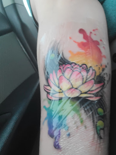Explore ear tattoo ideas for females, creative tattoo ideas in Loganville, available at Blue Siren Tattoos