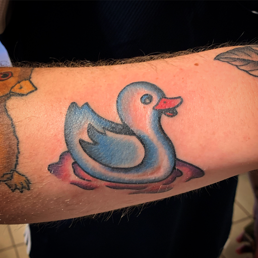 Explore lawyer tattoo ideas, creative tattoo ideas in Tulsa, available at Electric Gnome Tattoo