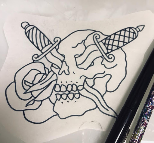 Explore small ear tattoo ideas, creative tattoo ideas in Milwaukee, available at Bay Street Tattoo Co.