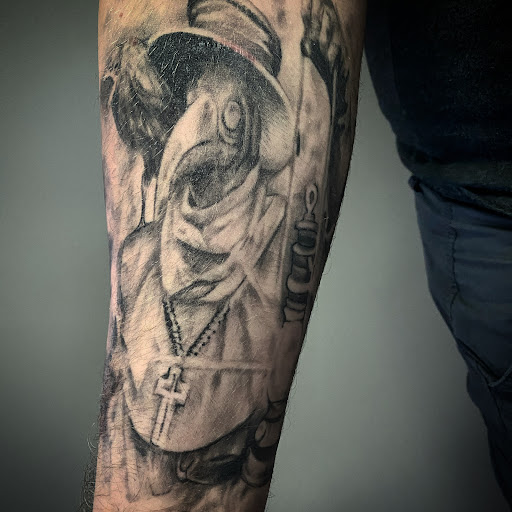 Explore rebirth tattoo ideas, creative tattoo ideas in Canfield, available at Black Rose Tattoo Studio