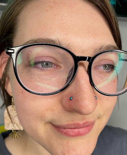 Explore rose tattoo ideas forearm, creative tattoo ideas in Saint Paul, available at Electric Strawberry Piercing