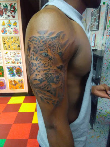 Explore arm flower tattoo ideas, creative tattoo ideas in Lima, available at White Wizard Tattoo & Body Piercing