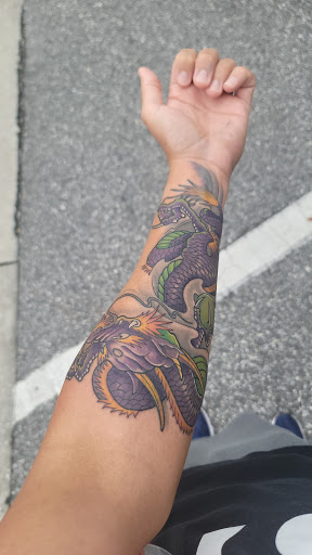 Explore wlw tattoo ideas, creative tattoo ideas in Lake Alfred, available at Moreira Ink