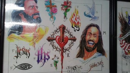 Tattoo Shop «Vertigo Tattoo & Body Piercing», reviews and photos, 7594 Shipyard Rd, Manns Harbor, NC 27953, USA