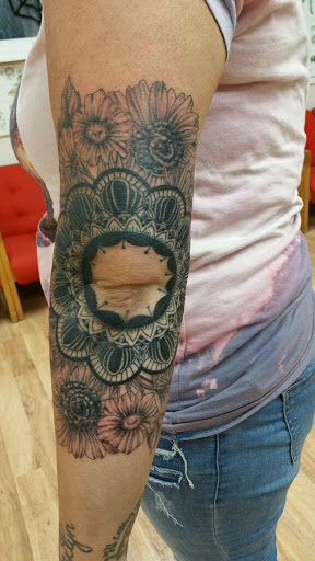 Find music symbol tattoo ideas for your next unique tattoo in Muncie at The Tattoo Studio