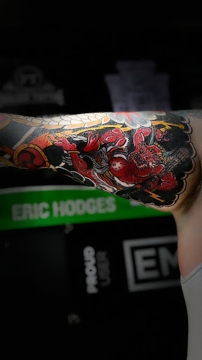 Explore crucifix tattoo ideas, creative tattoo ideas in Cadillac, available at Limitless Ink Tattoo Studio