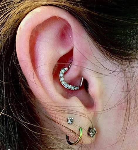 Explore chain link tattoo ideas, creative tattoo ideas in Chapel Hill, available at Spica Body Piercing