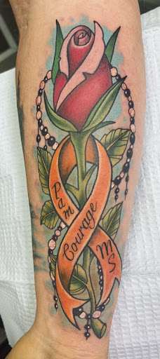 Explore tattoo flower ideas, creative tattoo ideas in Conroe, available at Monsters Ink, LLC