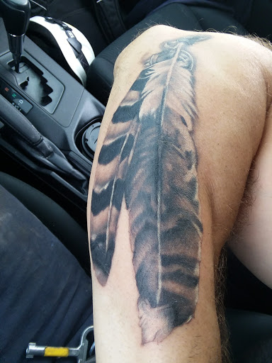 Explore name neck tattoo ideas, creative tattoo ideas in San Angelo, available at Inkland Tattoo Studio