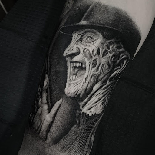 Explore cardinal tattoo ideas, creative tattoo ideas in Kissimmee, available at Ol Skool Tattoos Studio