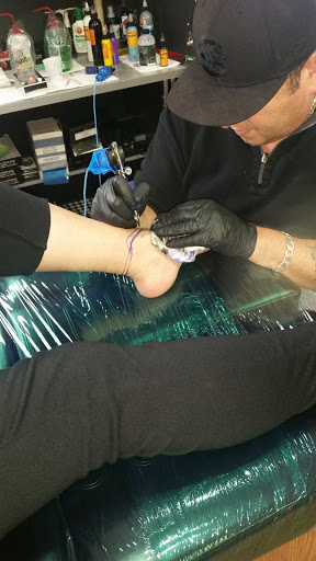 Tattoo Shop «Hot Spot Tattoo & Piercings», reviews and photos, 800 2nd St, Coralville, IA 52241, USA