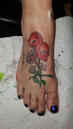 Find tattoo sunflower ideas for your next unique tattoo in Fenton at inkbox tattoos