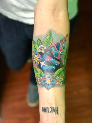 Explore dahlia tattoo ideas, creative tattoo ideas in Ogden, available at Savage Tattoo Shop