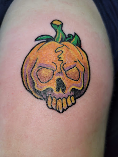 Explore mom son tattoo ideas, creative tattoo ideas in Angola, available at Hoodlum Ink