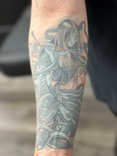 Explore blast over tattoo ideas, creative tattoo ideas in Beachwood, available at Genes Tattoo Company