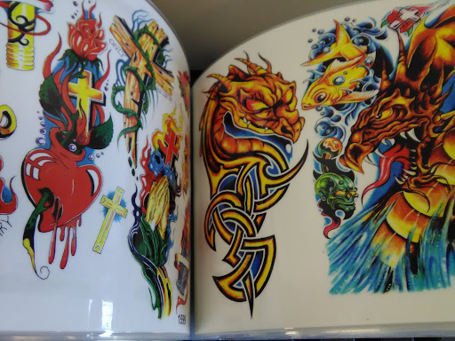 Explore cover up small tattoo ideas, creative tattoo ideas in Elyria, available at Body Revolution Tattoos & Body Piercings