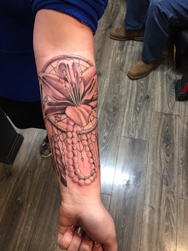 Explore tattoo ideas for birthdays, creative tattoo ideas in Lexington, available at LexInk Tattoo