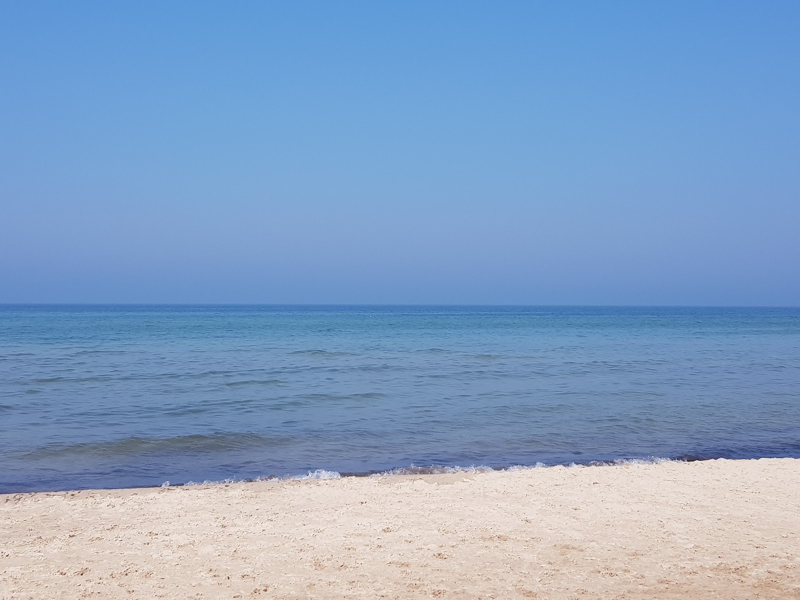 Foto van Vejciems beach met turquoise water oppervlakte