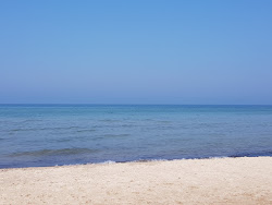 Foto von Vejciems beach mit türkisfarbenes wasser Oberfläche