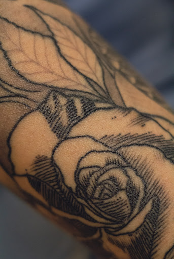 Explore dainty flower tattoo ideas, creative tattoo ideas in Hudson, available at The Bohemian Social Club