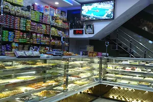 Punjabi Rasoi {New Guru Nanak Sweets & Restaurant} image