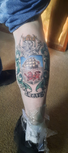 Explore korn tattoo ideas, creative tattoo ideas in Topeka, available at Absolute Tattoo