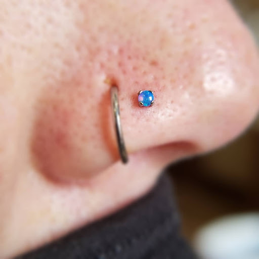 Explore lioness tattoo ideas for females, creative tattoo ideas in Kokomo, available at Beatnik piercing & jewelry