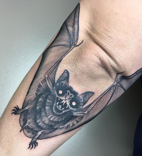 Explore tattoo hand ideas, creative tattoo ideas in Brooklyn, available at Queen of Crowns Tattoo