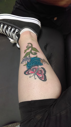 Explore sleeve cover up tattoo ideas, creative tattoo ideas in Shawnee, available at The Mad Tatter